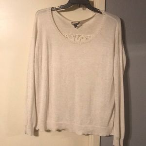 Light weight sweater, w/ lace detail on the back.